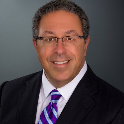 Smiling man in suit and tie